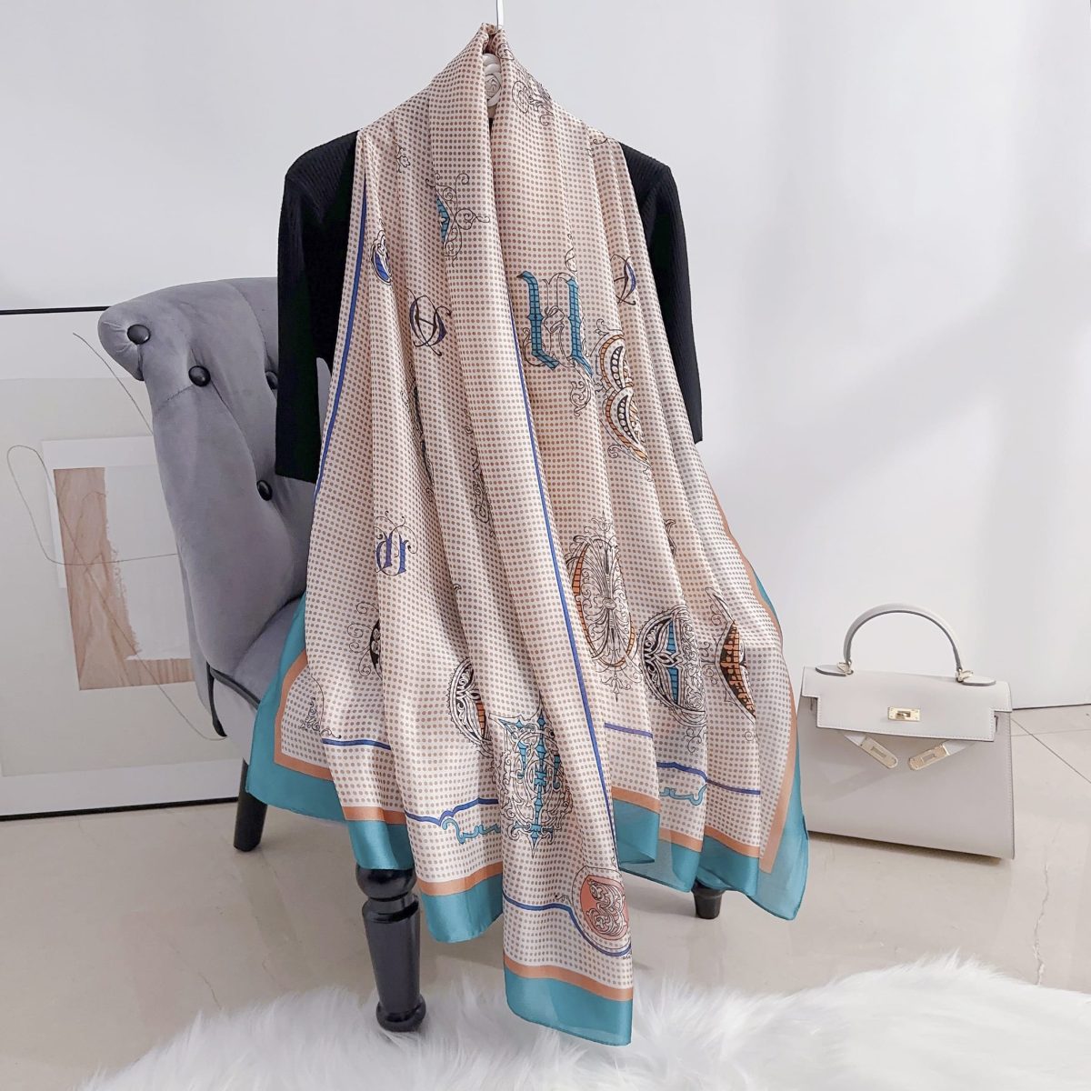 Timeless Brazen Orange Printed Silk Scarf - styled on model